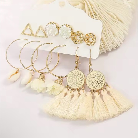 Gold and Cream Filigree Tassel Earrings
0431 - Picture 2 of 7